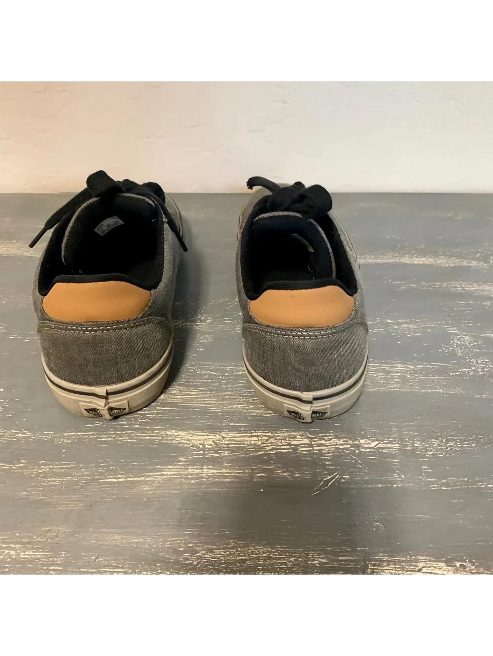 Gray low top lace-up sneakers